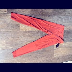 Brand new size medium coral leggings with pockets - never worn!